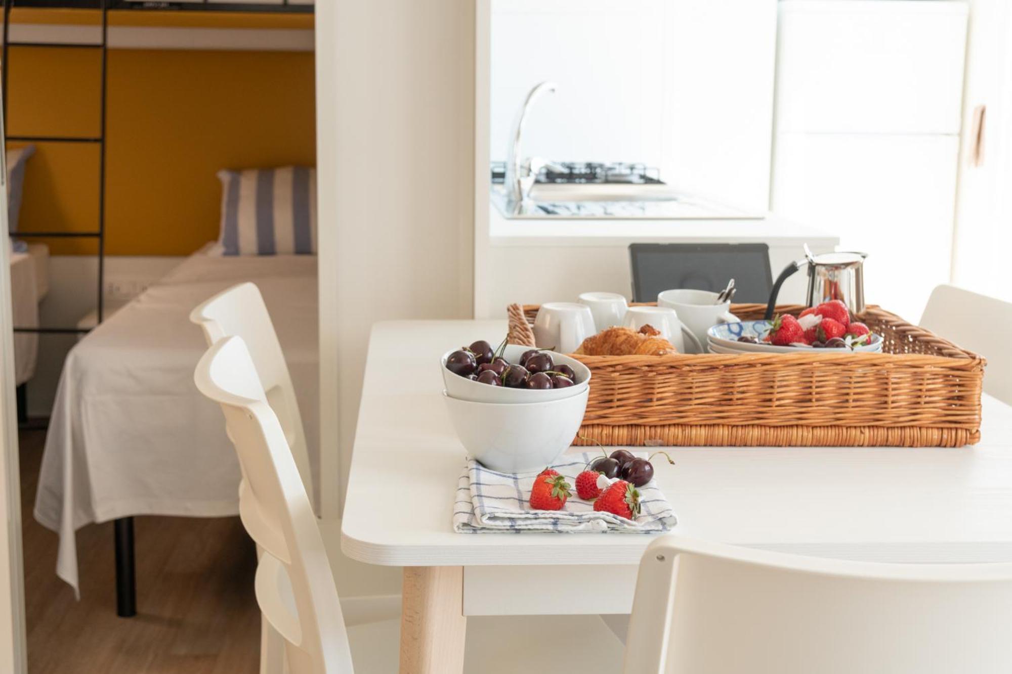 Campeggio Europa Silvella ซานเฟลีเช เดล เบนาโก ภายนอก รูปภาพ A breakfast table